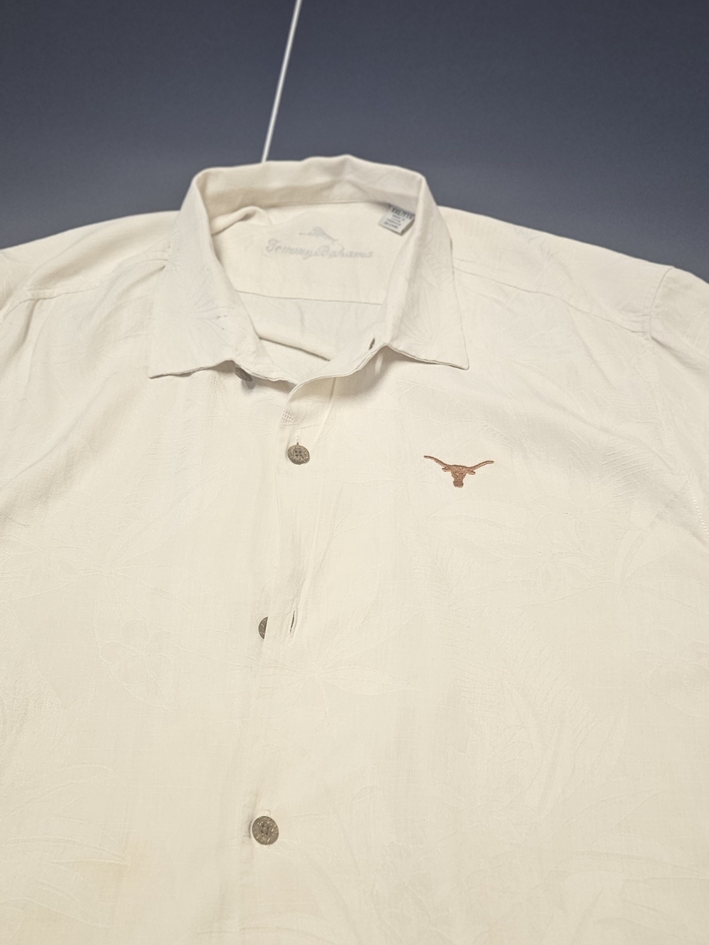 EUCTommy Bahama Men's Ivory Short-Sleeve with Embroidered Texas Longhorn Emblem.